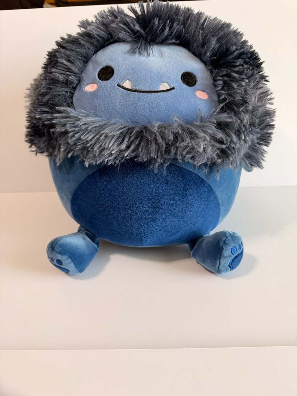 Squishmallows 11-inch Dani the Navy Blue Bigfoot Plush Toy